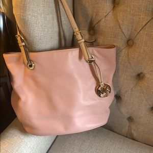 Michael kors pink leather medallion bag